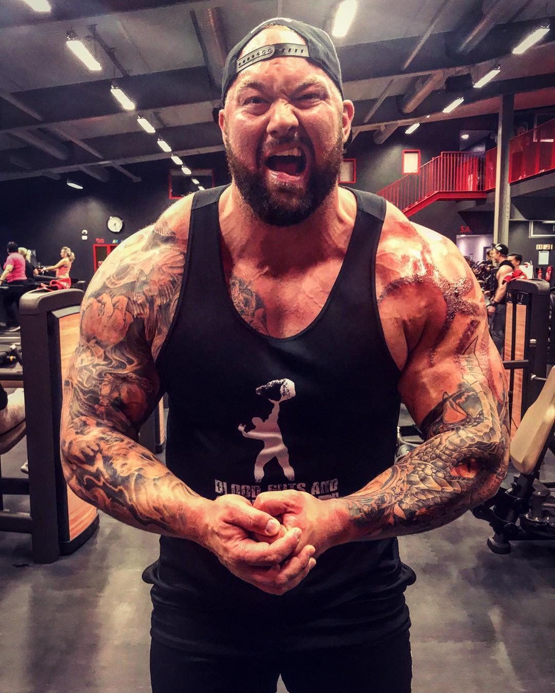 Hafthor Bjornsson squats 440 kg (970 lbs) Berserk Barbell